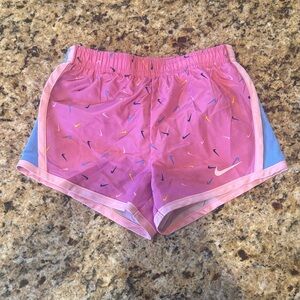 Nike Pink Girls' Athletic Shorts with Multicolor Swoosh Print